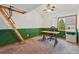 Carpeted office area with ladder to loft and large window at 3593 S Gibralter Cir, Aurora, CO 80013