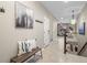 Inviting hallway with neutral tones, decorative art, and access to multiple rooms creating a warm atmosphere at 8099 Sabino Ln, Castle Rock, CO 80108