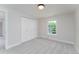 Spacious bedroom featuring a large closet and neutral decor at 8875 E Phillips Pl, Centennial, CO 80112