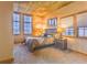 Bright bedroom with carpet and lots of light from two windows showcasing its coziness at 275 S Harrison St # 409, Denver, CO 80209