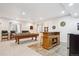 Finished basement with a full bar and pool table, great for entertaining guests at 15524 E 115Th Ave, Commerce City, CO 80022