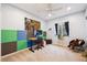 Charming bedroom with bright walls, a ceiling fan, and a cozy atmosphere at 15524 E 115Th Ave, Commerce City, CO 80022