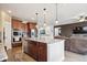 Gourmet kitchen with stainless steel appliances and granite countertops at 15524 E 115Th Ave, Commerce City, CO 80022