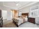 Spacious main bedroom with a ceiling fan and lots of natural light at 15524 E 115Th Ave, Commerce City, CO 80022