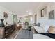 Inviting living room with modern decor, stylish furniture, and ample natural light at 1926 S Yates St, Denver, CO 80219