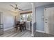 Cozy dining area with modern ceiling fan and natural light from the window at 13977 E Bails Pl, Aurora, CO 80012