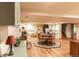 Spacious basement featuring a dining area, living space, and kitchenette, perfect for entertaining and relaxation at 3 Pinyon Pine Rd, Littleton, CO 80127