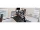 Bedroom with a work space and stationary bike for easy home workouts at 2565 Pierce St, Lakewood, CO 80214