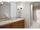 Well-maintained bathroom with custom vanity, granite countertop, and stylish fixtures at 392 Starmine Pl, Castle Rock, CO 80108