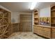 Charming wine cellar with custom wooden racks and flagstone flooring at 392 Starmine Pl, Castle Rock, CO 80108