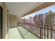 Serene private balcony with turf and a view of lush greenery at 14091 E Marina Dr # 308, Aurora, CO 80014