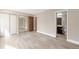 Bright bedroom with sliding closet doors and ensuite bathroom at 14091 E Marina Dr # 308, Aurora, CO 80014