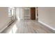 Spacious bedroom featuring large window and a sliding closet door at 14091 E Marina Dr # 308, Aurora, CO 80014