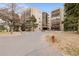 Well-maintained building with mature trees and attractive landscaping at 14091 E Marina Dr # 308, Aurora, CO 80014