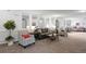 Inviting lobby area with comfortable seating and stylish decor at 14091 E Marina Dr # 308, Aurora, CO 80014