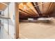 View of crawlspace with sealed vapor barrier at 13515 Milwaukee Ct, Thornton, CO 80241