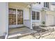 Inviting front porch with decorative glass door, welcome mat, and manicured landscaping for enhanced curb appeal at 13515 Milwaukee Ct, Thornton, CO 80241