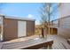 Backyard featuring a shed and deck with stairs at 3948 S Halifax St, Aurora, CO 80013