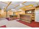 Finished basement with a recreation area, bar, and ample storage space at 3948 S Halifax St, Aurora, CO 80013