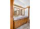 The bathroom features tile floors, a dual-sink vanity, and good lighting at 3948 S Halifax St, Aurora, CO 80013