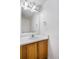 Bright bathroom features a mirror, vanity, and good lighting at 3948 S Halifax St, Aurora, CO 80013