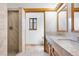 Bathroom boasts a shower, and double sink vanity, and tile flooring at 3948 S Halifax St, Aurora, CO 80013