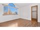 This bedroom is equipped with a spacious closet and large window at 3948 S Halifax St, Aurora, CO 80013