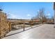 Expansive deck with stone pillar, wood railing and scenic views at 3948 S Halifax St, Aurora, CO 80013