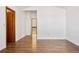 The living room showcases laminate floors and neutral-colored walls at 3948 S Halifax St, Aurora, CO 80013