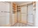 Spacious walk-in closet with custom shelving and ample storage at 2857 Xanthia Ct, Denver, CO 80238