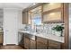 Well-appointed kitchen sink featuring modern fixtures and stylish backsplash tiles at 16378 Lamb Ave, Fort Lupton, CO 80621