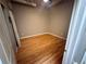 Bedroom with hardwood floors, neutral walls and bright overhead lighting at 1555 California St # 609, Denver, CO 80202