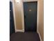 Neutral toned hallway featuring a dark blue door with the number 609 on it at 1555 California St # 609, Denver, CO 80202