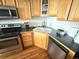Well-equipped kitchen features stainless steel appliances and ample counter space at 1555 California St # 609, Denver, CO 80202