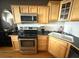 Kitchen features stainless steel appliances and an open design at 1555 California St # 609, Denver, CO 80202