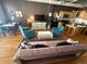 Bright and airy living space featuring an open layout with kitchen, seating area, and dining at 1555 California St # 609, Denver, CO 80202