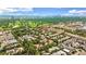 Aerial view of home with solar panels in a lush neighborhood close to parks and downtown, combining sustainability and location at 2821 E Cedar Ave # 14, Denver, CO 80209