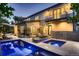 Backyard pool and patio with a sleek design, perfect for relaxation and entertaining at dusk at 2821 E Cedar Ave # 14, Denver, CO 80209