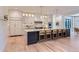 Spacious kitchen with marble countertops, a large center island, and stainless steel appliances at 2821 E Cedar Ave # 14, Denver, CO 80209