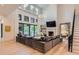 Bright living room with large windows, fireplace, and open floor plan at 2821 E Cedar Ave # 14, Denver, CO 80209