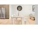 Stylish dining area featuring modern furniture, and stainless steel refrigerator at 3198 Blake St # 402, Denver, CO 80205