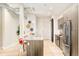 Well-appointed kitchen with granite countertops, stainless steel appliances, and modern cabinetry at 3198 Blake St # 402, Denver, CO 80205