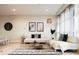 Stylish living room with comfortable seating and decorative rug at 3198 Blake St # 402, Denver, CO 80205