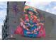 Vibrant mural on building exterior, showcasing art and culture at 3198 Blake St # 402, Denver, CO 80205