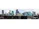 Downtown skyline view showcasing the city's architectural landscape and urban setting at 3198 Blake St # 402, Denver, CO 80205