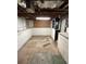 Unfinished basement with concrete foundation; features exposed ceiling and room for storage at 4111 S Delaware St, Englewood, CO 80110