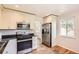 Modern kitchen with stainless steel appliances and plenty of cabinet space at 4111 S Delaware St, Englewood, CO 80110