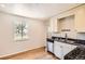 Bright kitchen with stainless steel appliances and hardwood floors at 4111 S Delaware St, Englewood, CO 80110