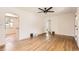 Living room with hardwood floors and neutral paint offering flexible layout options at 4111 S Delaware St, Englewood, CO 80110