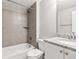 Bathroom with shower/tub combo, granite countertops, tile and white vanity at 11482 Colony Loop, Parker, CO 80138